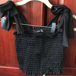 Black top with ties on the shoulders